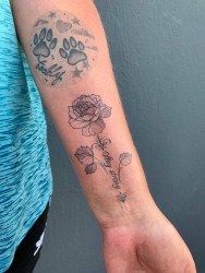 fine line flower tattoo